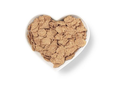 Eating Wheat Bran Flakes for Weight Loss | Livestrong.com American Heart Association Diet, Bran Buds, Raisin Bran Cereal, Bran Flakes, Raisin Bran, Eating Cereal, Wheat Bran, Bowl Of Cereal, Calorie Counter