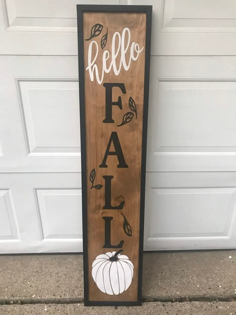 "This is a double sided rustic porch sign perfect summer, spring, and summer porch decor. The first side says \"Welcome\"  with a beautiful  true black sunflowers, and a golden yellow for the lettering. The second side is a special walnut stain with white lettering and black leaves. We also added a beautiful black frame around the sign to give it a little extra pop. Both sides have been sprayed with an outdoor poly so will withstand the elements. Each sign is 10 1/2\" wide and 60\"inches tall. Hello Fall Porch Leaner, 4ft Porch Signs, Fall Front Deck Decor, Fall Signs For Porch, Front Porch Leaner Sign, Hello Fall Porch Sign, Fall Diy Signs Outside, Fall Porch Signs Reversible, Fall Leaner Sign