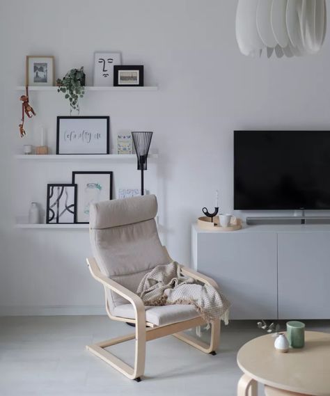 5 ways to style the ikea poäng armchair | livingetc | Ikea Lounge Chair, Poang Chair, Ikea Poang Chair, Ikea Armchair, Narrow Living Room, Ikea Living Room, Nursing Chair, Small House Interior Design, Colour Trends