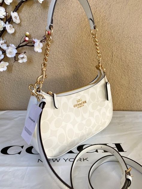 Coach Teri In Signature Canvas Gold/Chalk/Glacierwhite Leather Shoulder Bag Listed By Jasmine - Tradesy Coach Teri Shoulder Bag White, Coach Terri Shoulder Bag, Coach Teri Shoulder Bag, Chains Aesthetic, Dream Bag, Dream Bags, Handbag Essentials, Coach Logo, Girly Accessories