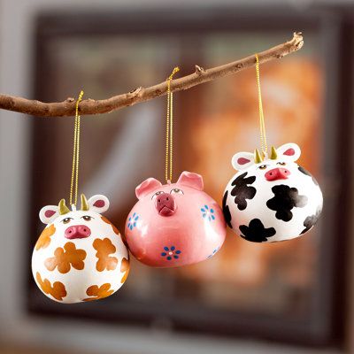 Bring the spirit of the farm right into your home with two cute cows and a charming pig handcrafted from dried calabash gourd by Peruvian artisan Blanca Canto, who paints by hand this set of three ornaments perfect for the holidays or decorating your indoor and outdoor spaces. The calabash or mate gourd is a material used in Peru since pre-Hispanic times for decorative and utilitarian objects. | The Holiday Aisle® Happy Farm Dried Gourd Hanging Figurine Ornament Set Brown/pink 2.6 x 2.8 x 2.8 in Mini Gourds Crafts, Gourd Ornaments Christmas, Utilitarian Objects, Gourd Ornaments, Calabash Gourd, Fall Pumpkin Crafts, Wind Bell, Gourds Birdhouse, Happy Farm