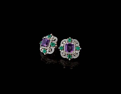 Farah Khan for Tanishq amethyst stud earrings surrounded with emeralds and diamonds set in yellow gold. Antique Earrings Studs, Pakistani Wedding Jewelry, Bridal Jewelry Pakistani, Diamond Earrings Indian, Unusual Engagement Rings, Van Cleef And Arpels Jewelry, Buy Gold Jewelry, Amethyst Studs, Egyptian Jewelry