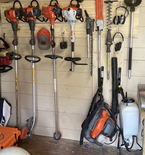 Landscaping Tools Organization, Stihl Tools Storage, Lawn Equipment Storage Ideas, Lawn Equipment Storage, Garage Organization Cheap, Yard Tool Storage Ideas, Lawn Tool Storage, Garage Hanging Storage, Garage Storage Plans