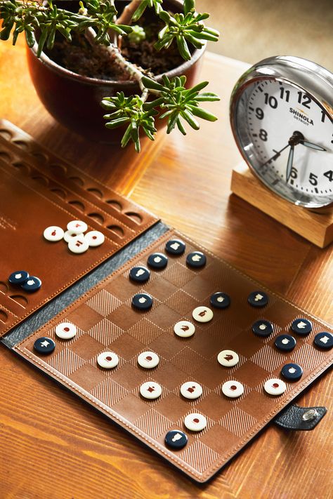 You like to win in style. We don't blame you. Hand-poured and hand-painted game pieces elevate the look and feel of this travel chess and checkers set featuring chess icons on one side and our signature Shinola bolt on the other. From the hand-crafted gameboard to the resin game pieces, we went to great lengths to bring this unique set to life with our American manufacturing partners. Chess Aesthetic, Paint Games, Shinola Detroit, Travel Chess Set, Beach Stuff, Great Lengths, Game Pieces, Chess Set, Funny Comics