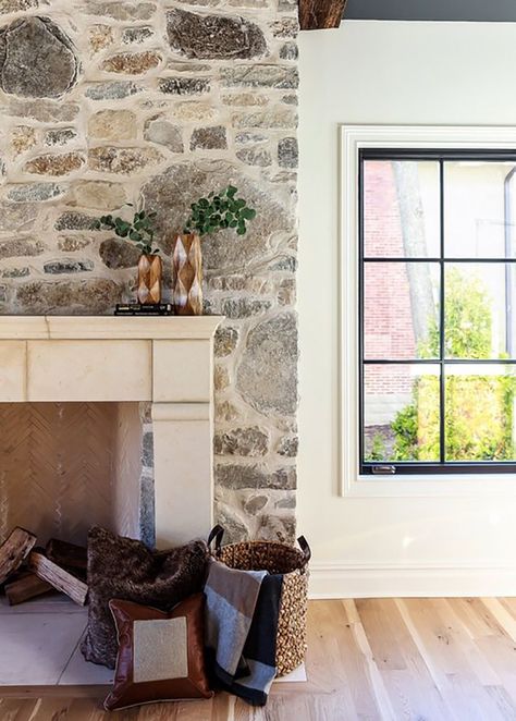 How to: DIY Over-Grouted Stone Fireplace! (For Under $200!) - Chris Loves Julia Stone Fireplace Shapes, Back To Back Fireplace Ideas, Stone Fireplace Black Mantle, Cottage Gas Fireplace, Stone Cottage Fireplace, English Stone Fireplace, Living Room Tall Windows, River Stone House, Cottage Stone Wall