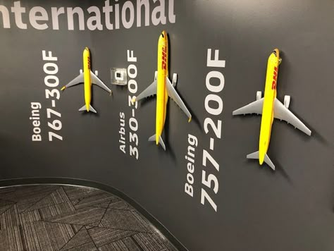 DHL Airplanes Flying Off the Walls of their Corporate Offices in Miami, Florida! Small Office Design Interior, Dental Office Design Interiors, Small Office Design, Corporate Offices, Interactive Museum, Interactive Exhibition, Office Interior Design Modern, Airport Lounge, Air India