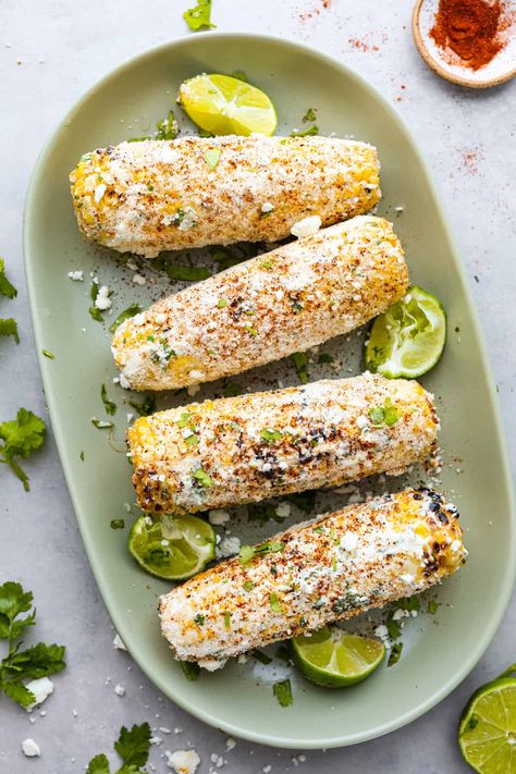 Grilled Mexican Street Corn is the perfect grilled corn slathered with an amazing mayonnaise blend and topped with parmesan cheese and chili powder. This is one of the best corn recipes you will eat! Easy Elote Recipe, Elote Corn Recipe, Grilled Elote, Easy Elote, Corn Elote Recipe, Best Corn Recipe, Corn In The Oven, Grilled Corn Recipes, Oven Roasted Corn