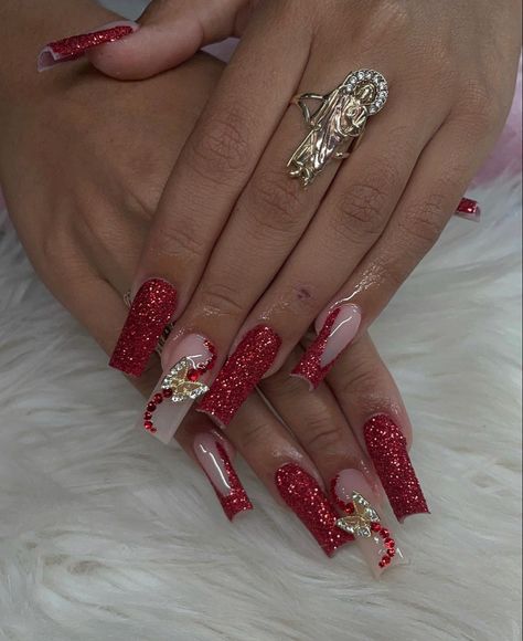 Red Nails Bling Gems, Red Quince Nails Medium Length, Red Nails Quinceanera, Red Nails With Butterfly, Red Rhinestone Acrylic Nails, Red And Silver Nails For Prom, Medium Red Nails, Red Prom Nail Ideas, Red Blinged Out Nails