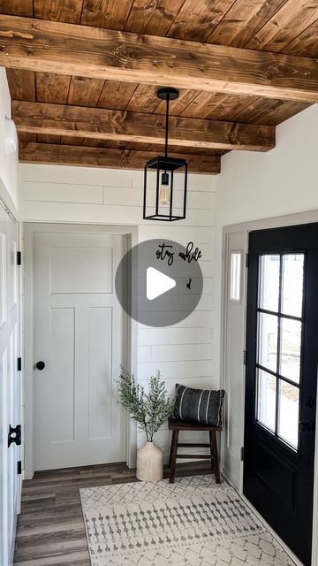 Nicole Kerns - DIY and Design 🔨 on Instagram: "This is by far one of my favorite makeovers in this house! What do you think?!  I’ve always dreamed of a wood plank ceiling but knew it would be very expensive to hire it out.  This was when I decided to pick up some power tools and do it myself (with my husbands help here and there 😉) Follow along with me @hillhousediaries so I can teach you how you can do it too!   #entryway #entrywaydecor #entry #blackdoors #roommakeover #makehomeyours #hometransformation @beforeafter_ideas #diyhome #diyprojects #peepmypad #prettylittleinteriors #ispymoderndiy #cornersofmyhome #modernfarmhouse #plankceiling #woodceiling #fauxbeams #woodbeams" Wood Ceiling Entryway, Entryway Ceiling Ideas, Younger And Groove Ceiling, Wood Plank Ceiling, Plank Ceiling, Faux Beams, Living Room Decor Cozy, Black Doors, Wood Ceilings