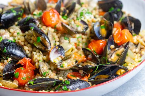 Fregola With Clams And Mussels | Giadzy Mussels Recipes, Clams And Mussels, Summer Dinner Parties, Clam Pasta, Giada De Laurentiis Recipes, Giada Recipes, South Of Italy, Mussels Recipe, Weeknight Recipes