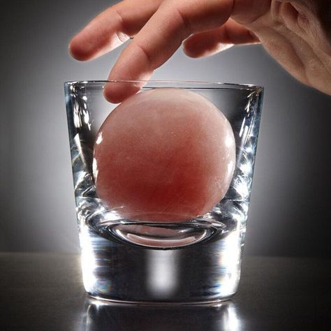 Ice-sphere cocktails put your cocktail inside of the ice. These ice-bound drinks will shatter your expectations. Learn more today at Liquor.com. Best Old Fashioned Recipe, Clear Ice Cubes, Ice Sphere, Ice Cube Melting, Ice Games, Round Ice Cubes, Sphere Ice, Fantasy Food, Round Ice