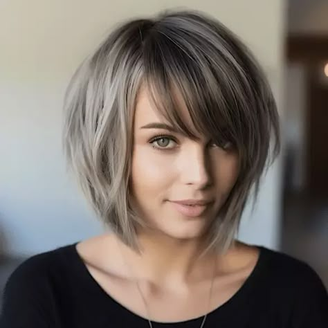 Salt And Pepper Bob With Bangs, Tapered Bob Haircut Shoulder Length, Medium Bob Haircuts For Thick Hair, A Line Bob With Side Bangs, Waterfall Bangs Medium Hair, Angled Bob Hairstyles With Bangs, Stacked Bob Haircut With Bangs, Angled Bobs With Bangs, Bob Long Bangs