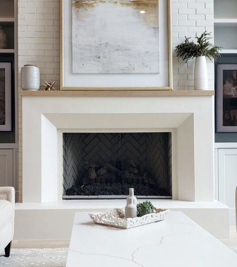 Crate And Barrel Fireplace, Linear Fireplace With Cabinets On Each Side, Cast Stone Linear Fireplace, Dresser On Either Side Of Fireplace, Precast Fireplace Surround, Cement Fireplace Mantel, New Fireplace Surround, Clean Modern Fireplace, Fireplace Surround With Corbels