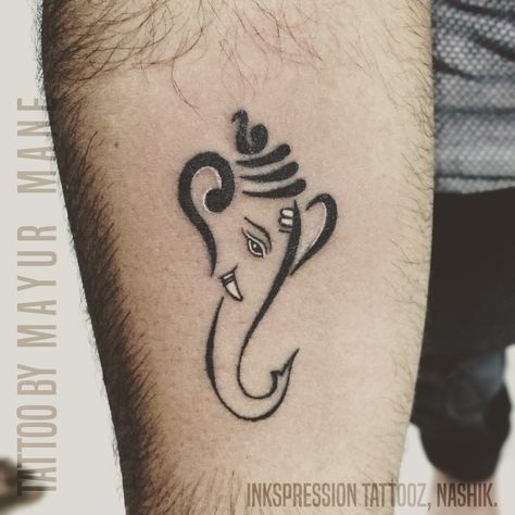 Small Lord Ganesha Tattoo. Lord Ganesha is the lord of New Beginnings, Prosperity & Remover of Obstacles. #inkspressiontattooz #getinked #ganeshatattoo #lordganesha #ganesha #smalltattoos #tattooedboys #tattooedmen #tattooaddict #nashiktattoos #tattoostudio #nashikgram #inkedboy #inkgram #inkstagram #lovefortattoos #lovetattoos #nashiktattoos #tattooinnashik #tattooshopinnashik #tattoostyle #besttattoo #besttattooinnashik Ganpati Tattoo On Neck, Small Ganesha Tattoo Design, Vinayagar Tattoo Design, Simple Ganesha Tattoo, Ganesh Tatoos Design, Lord Ganesh Tattoo Designs, Ganapati Tattoo Design, Ganesha Tattoo Design For Men, Small Tattoos God