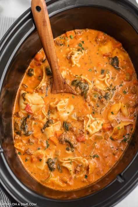 Crockpot Italian sausage tortellini soup recipe (& VIDEO!) Tortellini Soup Recipes Easy, Sausage Soup Crockpot, Tortellini Soup Crockpot, Crockpot Italian Sausage, Sausage Crockpot Recipes, Italian Crockpot Recipes, Italian Sausage Tortellini, Italian Sausage Tortellini Soup, Crock Pot Tortellini