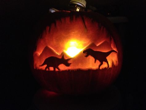 Dinosaur Jack O Lantern, Pumpkin Carving Dinosaur, Pumpkin Carving Ideas Dinosaur, Dino Pumpkin Carving Ideas, Volcano Pumpkin, Trex Pumpkin, Dinosaur Pumpkin Carving, Pumpkin Dinosaur, Dinosaur Pumpkin