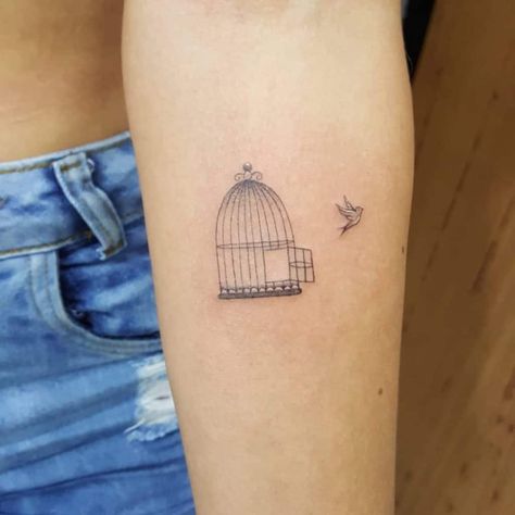 60+ Tattoos Which Symbolize Freedom (2021 Updated) 25 Bird Coming Out Of Cage Tattoo, Open Up Tattoo, Being Free Tattoos, Butterfly Breaking Free Tattoo, Small Tattoos Freedom, Free At Last Tattoo, Dove Flying Out Of Cage Tattoo, Cage And Bird Tattoo, Bird Free From Cage Tattoo