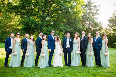 With their April date, Elizabeth and Justin knew they wanted their wedding day to reflect a springtime style. Elizabeth's bridesmaids wore flowing mint green, full-length dresses complemented by Justin's groomsmen, who wore casual navy suits with mint green ties. Green Wedding Party, Mint Green Wedding, Hashtag Generator, Shoes Pictures, Mint Bridesmaid, Mint Bridesmaid Dresses, Wedding Parties Colors, Wedding Mint Green, Wedding Color Combos