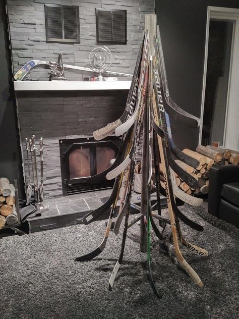 Couldn't find a good hockey stick Christmas Tree on here so I built my own. Hockey Projects, Hockey Stick Furniture, Hockey Stick Crafts, Hockey Christmas Tree, Chemistry Tattoo, Hockey Boy, Hockey Diy, Hockey Crafts, Hockey Tournament