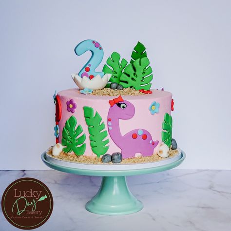 3 Rex Cake Girl, Two Rex Birthday Cake, Girly Dinosaur Party Cakes, Three Rex Birthday Party Girl Cake, Pink And Purple Dinosaur Cake, Girl Dinosaur Birthday Cake, Fondant Dinosaur, Girl Dinosaur Cake, Dinosaur Cake Girly