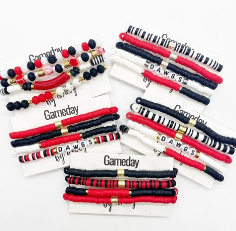 "Gameday Heishi Beaded Bracelets! Completely customizable! These are stretch bracelet sets that can be made any color or any size if specified in notes during checkout! Available in silver or gold accents. Bracelet sets will be made standard size (6.5-7\") unless otherwise requested." Texas Tech Clay Bracelet, Georgia Clay Bead Bracelet, Uga Beaded Bracelet, School Spirit Heishi Bracelets, Sports Bracelet Design, School Spirit Jewelry Diy, Clay Bead Bracelet Ideas Red And Black, Maroon Clay Bead Bracelet, High School Bracelets