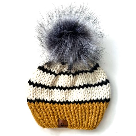 b.e.happe hats, black and yellow winter pom hat Crochet Slouchy Beanie, Knit Pom Pom Hat, Knit Pom Pom, How To Wash Hats, Knitted Heart, Classic Hats, Slouch Hat, Hat Ideas, Faux Fur Pom Pom