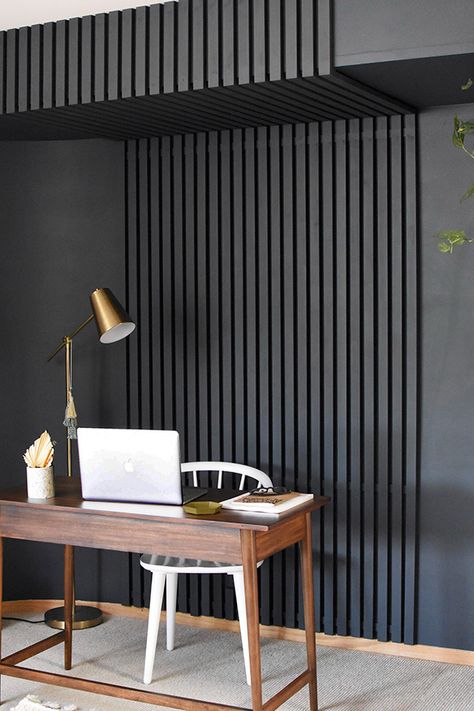 Painted Wood Slat Wall - Delineate Your Dwelling Modern Minimalist Accent Wall, Modern Slat Wall Bedroom, Black Wall Trim Ideas, Navy Slat Wall, Textured Black Wall, Slatted Accent Wall, Black Wall Behind Tv, Painted Slat Wall, Black Wall Office