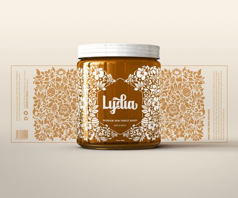 Lydia is a raw honey product from the Greek mountains, a naturally rich and biodiverse ecosystem. Bill Pappas represents all the flowers and plants that the local bees may create their honey from in a beautiful illustrative mural that wraps around the honey jar. Lydia Honey Branding & Packaging Design by Bill Pappas. Honey Label Design, Jam Packaging, Honey Logo, Honey Label, Honey Brand, Honey Packaging, Jar Packaging, Honey Design, Jar Design