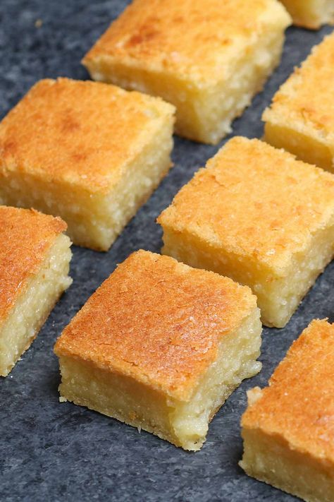 Ingredients  1x 2x 3x ▢ 2 cups Mochiko glutinous sweet rice flour ▢ 1 cup sugar ▢ 1 teaspoon baking powder ▢ 2 eggs ▢ 1/2 cup milk ▢ 5 tablespoons unsalted butter (melted) ▢ 1/2 teaspoon vanilla extract ▢ 1 can 14-oz coconut cream (or canned coconut milk) Instructions  Preheat the oven to 350°F (1 Mochi Malasada Recipe, Butter Mochi Cake Recipe, Mochi Cake Recipe, Baked Mochi, Hawaiian Butter Mochi, Butter Mochi Recipe, Cookie Tarts, Hawaiian Dessert Recipes, Mochi Recipes