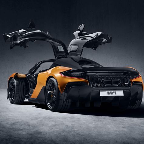 McLaren reveals 1,258-hp W1, its fastest production car The $2 million-plus halo model bristles with new tech including a lightweight plug-in hybrid system, bespoke carbon-fiber monocoque and slippery bodywork. Mclaren Models, James Hunt, New Tech, Mclaren P1, Gt Cars, Mclaren F1, Street Cars, Car And Driver, Model Car