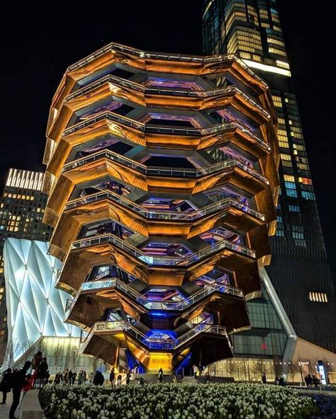 Vessel, at night. It's one of the many great things to do in Hudson Yards. The Vessel New York, Hudson Yards Nyc, New York At Night, Post Modern Architecture, Nyc At Night, New York Pictures, The Vessel, Hudson Yards, Modern Pictures