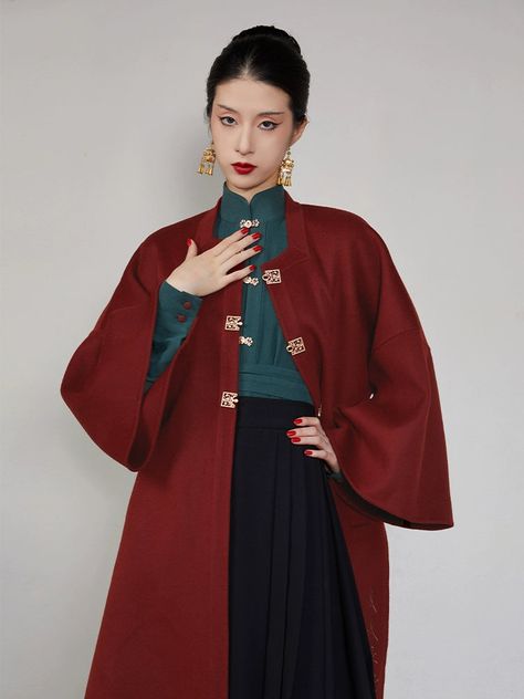 Made from 100% pure sheep wool, this Ming Dynasty inspired trench coat will leave you cozy and stylish all winter long! Features the signature 18th century square collar design, allowing innter shirts to peak through. Ornate golden buttons feature tiny plum blossoms blooming from golden branches. Embroidered blessings in traditional calligraphy adds good luck wherever you go. Durable, soft, and comfortable, this jacket is perfect for layering over traditional and modern outfits. Pair with the pr Plum Blossoms, Cute Skirt Outfits, Wool Winter, Ming Dynasty, Chinese Clothing, Cute Skirts, Character Outfits, Sheep Wool, Coat Fashion