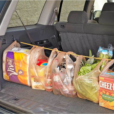 11 Handy Hints for Bungee Cords Car Organization Hacks, Car Organization, Bungee Cords, Grocery Bags, Family Handyman, Car Hacks, Bungee Cord, Cars Organization, Car Cleaning