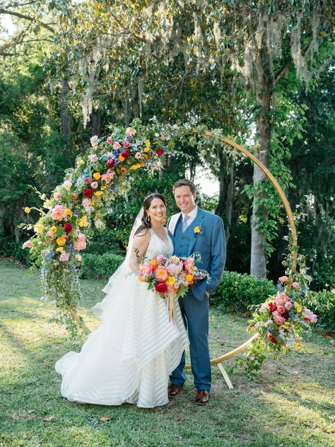 Circular Flower Arch, Diy Flower Circle Arch, Round Wedding Arch With Flowers, Summer Wedding Arches Outdoor Ceremony, Garden Party Wedding Arch, Wildflower Ceremony Arch, Wedding Arch Wildflowers, Hay Ring Wedding Arch, Wildflower Arch Wedding