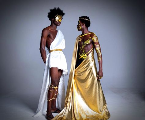 Black male models dressed as the sum and moon Sun Costume Man, Sun God Outfit Male, Sun Themed Outfits Male, Greek God Outfits Men, Sun God Costume, Greek Fashion Men, Greek God Costume Male, Greek Inspired Fashion, Mythology Costumes