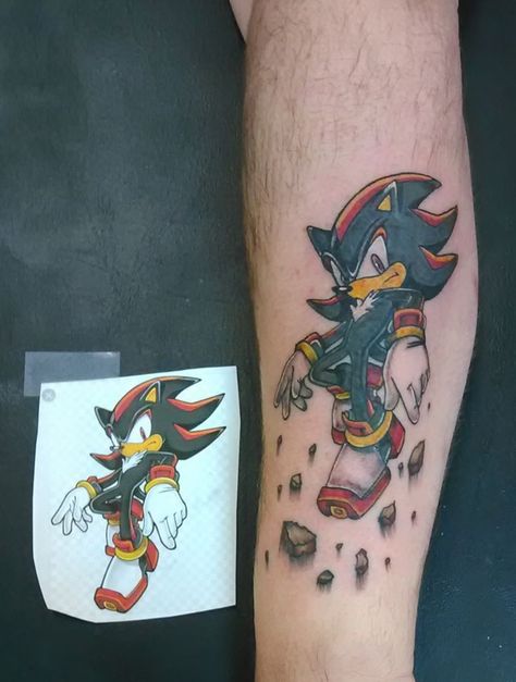 Sonic tattoo game character tattoo Line Tattoo For Men, Hedgehog Tattoo Ideas, Sonic The Hedgehog Tattoo, Sonic Tattoo, Hedgehog Tattoo, Nintendo Tattoo, Sonic Face, Shadow Tattoo, Shadow Sonic