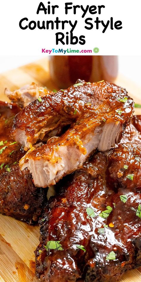 A close up picture of tender air fryer country style ribs, with title text at the top. Country Style Pork Ribs In Ninja Foodi, Air Fryer Boneless Country Ribs, Air Fryer Bbq Ribs Recipe, Airfryer Pork Ribs Recipes, Boneless Country Style Pork Ribs Recipes, Country Pork Ribs Air Fryer, Bbq Boneless Pork Ribs In Air Fryer, Air Fryer Country Style Ribs Boneless, Bbq Ribs In Air Fryer