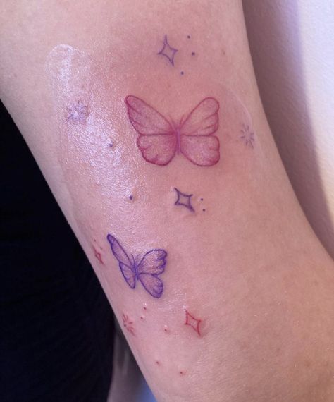 Purple Ink Tattoo Words, Purple Butterflies Tattoo, Pink Purple Tattoo, Purple And Pink Butterfly Tattoo, Blue And Pink Tattoo, Pink Linework Tattoo, Pink Tattoo Healed, Purple Tattoo Aesthetic, Pink Tattoo Dark Skin