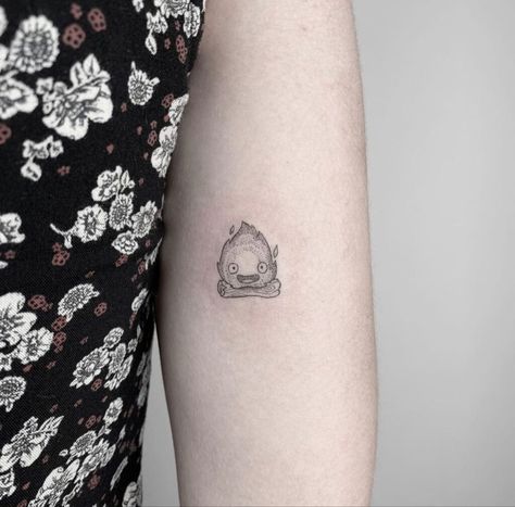 Unique Small Tattoos For Women Simple, Small Calcifer Tattoo, Small Studio Ghibli Tattoo Ideas, Bruh Tattoos, Studio Ghibli Calcifer Tattoo, Studio Gibhili Tatoos, Tattoo Ideas Studio Ghibli, Small Ghibli Tattoo, Ghibli Tattoo Minimalist