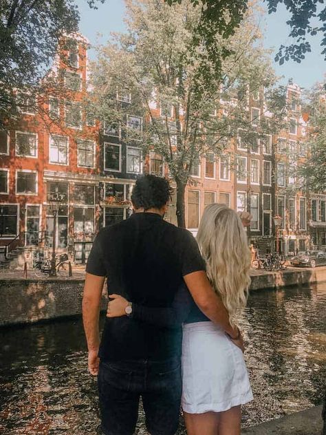 Your complete couple's guide to Amsterdam! Check out the most romantic things to do in Amsterdam, the Netherlands, including romantic hotels, beautiful walks, and restaurants. All you need to plan the perfect romantic weekend in Amsterdam, Holland. Perfect for date nights in Amsterdam! Amsterdam for couples | Romantic Amsterdam | Romantic restaurants Amsterdam | Honeymoon Amsterdam | Couples travel guide Amsterdam #amsterdam #Netherlands #holland #mapsnbags Amsterdam Honeymoon Aesthetic, Honeymoon In Amsterdam, Couple In Amsterdam, Amsterdam Couple Photos, Netherlands Honeymoon, Amsterdam Romantic, Amsterdam Honeymoon, Romantic Amsterdam, Amsterdam Couple