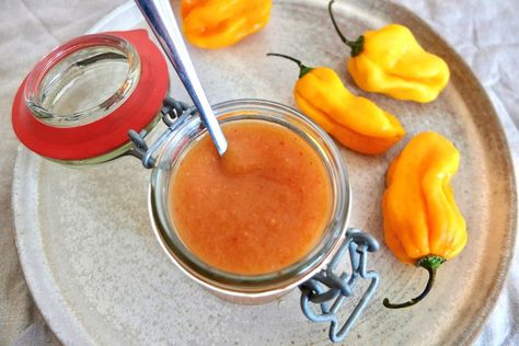 Scotch bonnets are revered for their heat, but once tempered with sweet fruits, vinegar and spices, they can become the backbone of a fantastic chilli sauce – as this recipe proves. Bbq Starters, Scotch Bonnet Hot Sauce Recipe, Mango Vinegar, Pineapple Hot Sauce, Mango Hot Sauce, Hot Sauce Recipe, Dinner Board, Pepper Sauce Recipe, Mango Jam