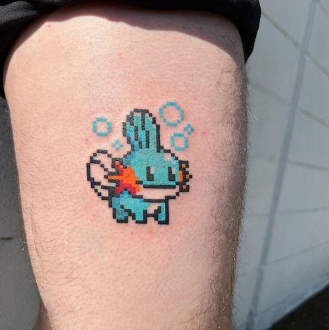 Pixel Tattoos! ₍•͈ᴗ•͈₎（@dripontheinternet）• Instagram 相片與影片 Pixel Tattoo Design, Pokemon Tattoo Pixel, Pixel Pokemon Tattoo, Minimal Pokemon Tattoo, Poliwhirl Tattoo, Mudkip Tattoo, Pikmin Tattoo, 8 Bit Tattoo, Pixel Art Tattoo