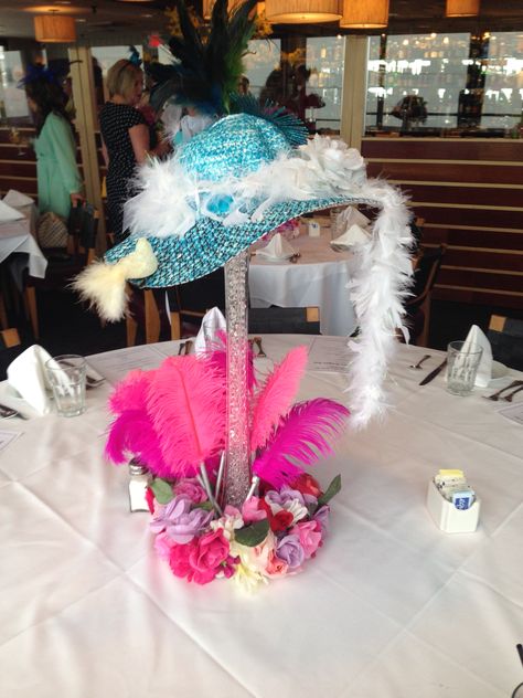 Hat themed centerpiece used at bridal shower created from thrift store, dollar store, and craft store finds Hats And Heels Party Ideas, Hat Decorating Ideas Diy, Unconventional Centerpieces, Hat Centerpieces Table Decorations, Hat Party Ideas Ladies, Hat Decorating Ideas, High Tea Decorations, Diy Tea Party Hats, Hat Centerpieces