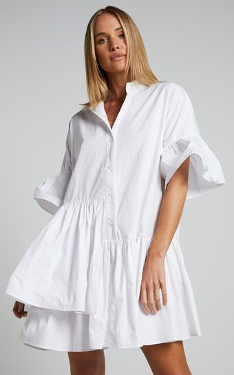 Elowen Mini Dress - Button Up Asymmetrical Tiered Smock Dress in White | Showpo (US, UK & Europe) Morgan Wallen Concert, Dress Order, Short Sleeve Mini Dress, Dinner Date, Mini Shoulder Bag, Button Dress, Lace Up Heels, Elbow Length Sleeve, Smock Dress