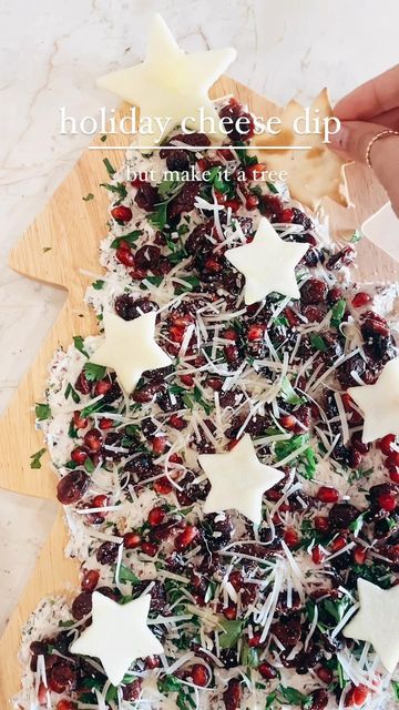 k r i s t e n on Instagram: "this holiday appetizer is so fun & festive • a perfectly delicious christmas tree cheese dip board • like the #butterboard but only better • the best part of this … you literally cannot mess it up, gang • a little mess is a-ok on this decked out tree start by spreading a soft cheese of your choice • i went with an herbed goat cheese • next layer the following ingredients: craisins, parsley, pomegranates, parmesan cheese, and apples for the stars you can use any g Goat Cheese Christmas Tree, Christmas Tree Charcuterie Board Dessert, Goat Cheese Christmas Board, Holiday Goat Cheese Board, Christmas Tree Butter Board, Goat Cheese Board Ideas, Christmas Charcuterie Board Ideas Holidays, Goat Cheese Board, Christmas Dessert Charcuterie Board