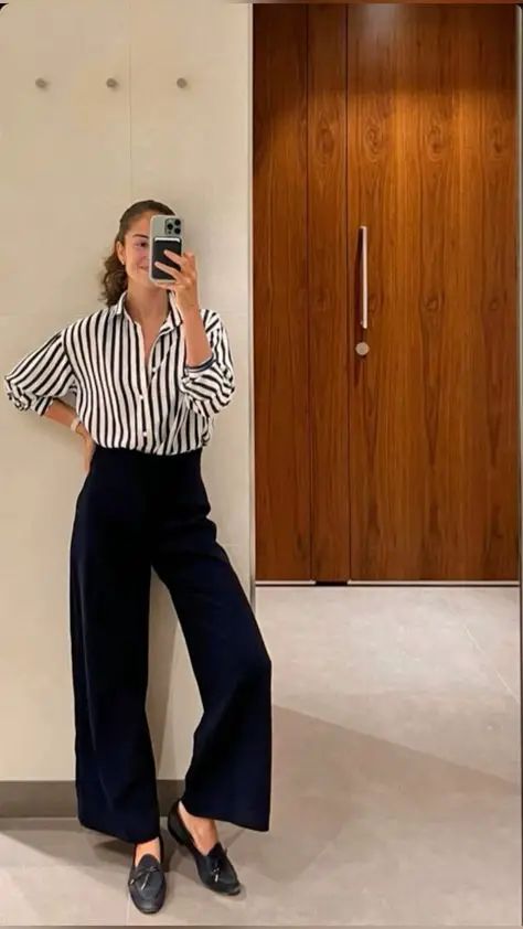 How To Style Wide Leg Pants: 12 Outfit Ideas With Wide Leg Pants To Style This Spring-Summer Fit - MorningKo Long Vest With Wide Leg Pants, Wide Leg Tweed Pants Outfit, Wide Leg Professional Outfit, Wide Leg Twill Pants Outfit, Black Pull On Pants Outfit, Work Outfits Wide Leg Pants, Wide Leg Pant Work Outfit, Navy Blazer Black Pants Outfit Women, Black Wide Leg Dress Pants Outfit