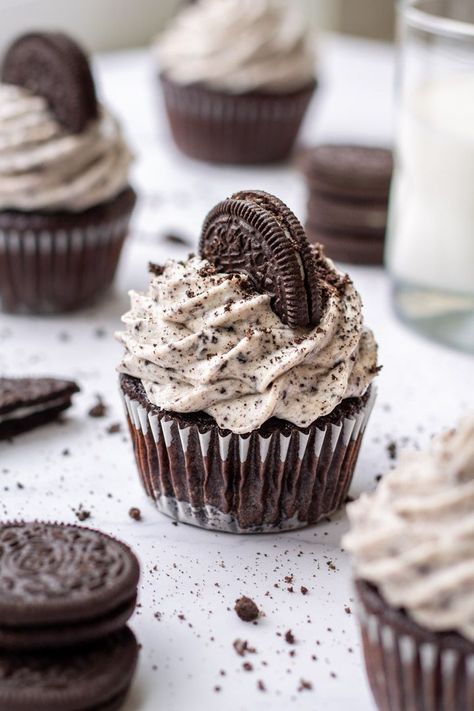 Cookies and cream cupcakes with a chocolate ganache core and oreo crust. The name of these pretty much says it all, but these cookies and cream cupcakes are heaven in mini cake form. The chocolate ganache is soft and fudgy in the center while the oreo crust adds the classic oreo cookie crunch texture underneath the decadent chocolate cake.