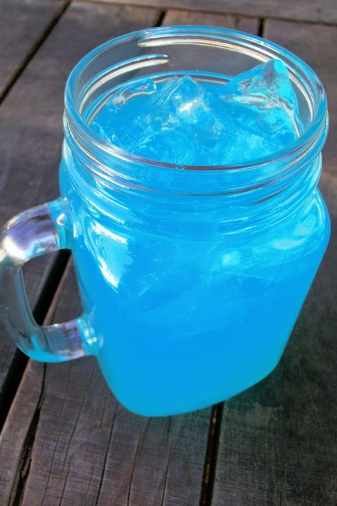 This Blue Lemonade Tiffany Punch is perfect for Summer. The combination of tart lemonade with sweet berry punch is refreshing and so tasty! Neon Punch Recipe, Blue Raspberry Lemonade Punch, Blue Lemonade Non Alcoholic, Blue Raspberry Lemonade Recipe, Tequila And Sprite, Blue Lemonade Recipe, Raspberry Lemonade Punch, Lemonade Punch Recipe, Punch Recipes For Kids