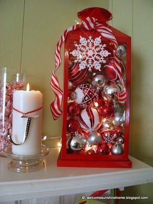 Lantern filled with christmas ball ornaments and lights from Welcome Sunshine.  All the mantel ideas here are great! Decorative Lanterns, Christmas Lantern, Red And White Christmas, Fabulous Christmas, Christmas Lanterns, Noel Christmas, Christmas Love, Candy Canes, Decoration Christmas