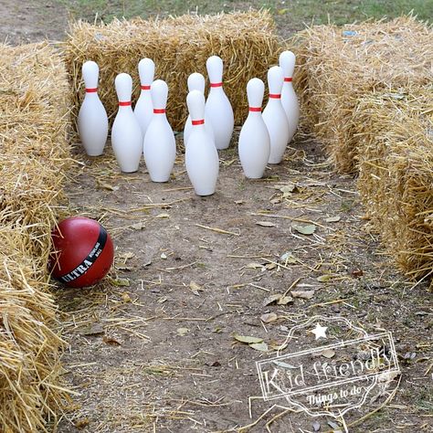 Hay Bale Bowling is a fun and easy to set up fall and summer party game for outdoor fun. It's even perfect for Thanksgiving fun with your family. www.kidfriendlythingstodo.com #hay #bowling #fall #fun #outdoor #Thanksgiving #game #idea #activity Balloon Games For Kids, Summer Party Games, Outdoor Thanksgiving, Outdoor Fun For Kids, Fall Activity, Bowling Games, Fall Games, Harvest Party, Fall Fest